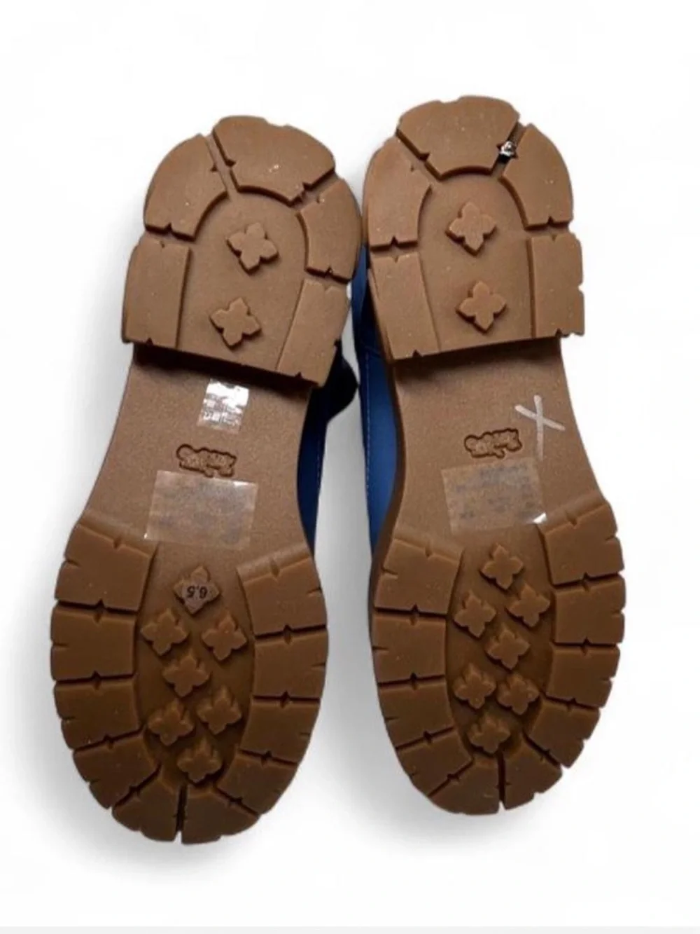 Coach Rya Boots inSky Blue. Quilted puffer-style nylon, leather upper.